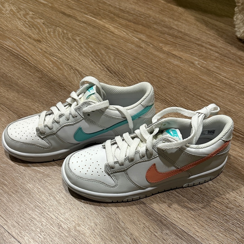 Nike White Sneakers with Orange and Teal Accents